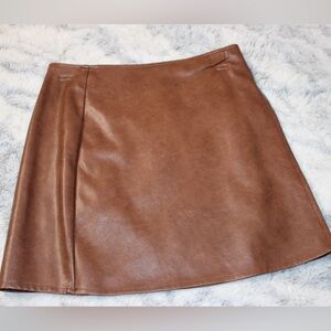 Brown mini tight leather skirt